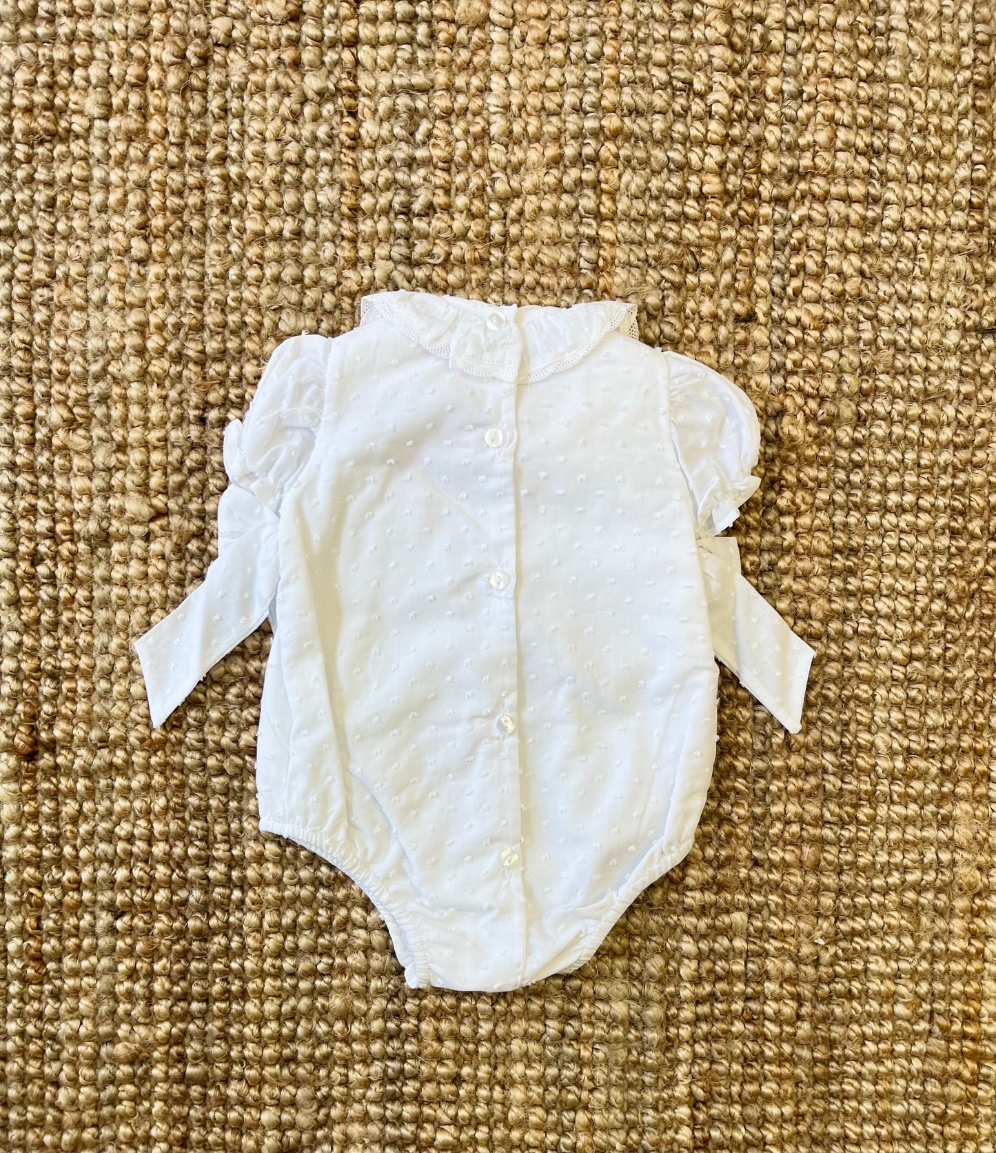 Pagliaccetto con fiocchi